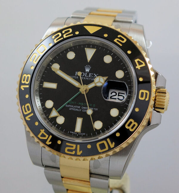 Rolex GMT II 18k Gold & Steel 116713LN Rare 2011 MODEL ***UNUSED***  Box & Card