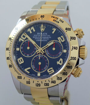 Rolex Daytona 18k Gold   Steel  Blue Arabic dial  116523 2 year Rolex Service Warranty 