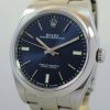 Rolex Oyster Perpetual 39,  Blue; Green-dot dial  114300